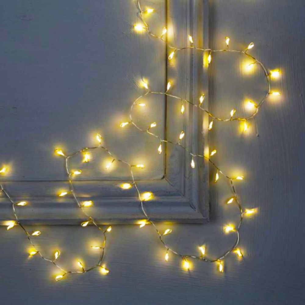 Светодиодная новогодняя гирлянда ЭРА ЕNIG - 100M нить Мишура 3 м теплый белый 150 microLED 220 V