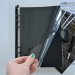 Обложка силиконовая (ПВХ) черная с хлястиком из кожзама и большой кнопкой, формат А5