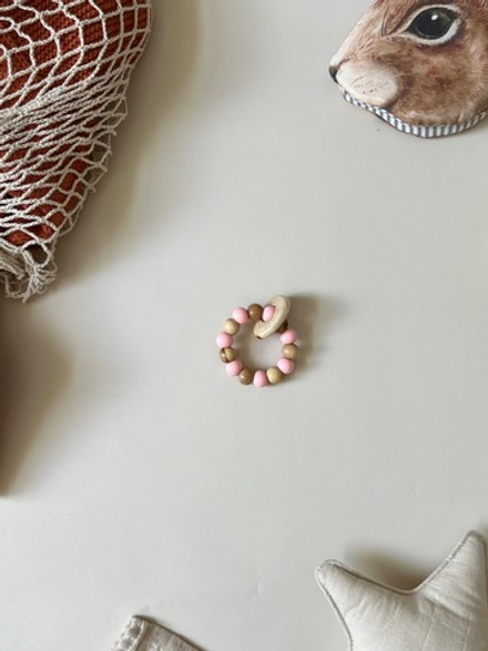 Развивающий прорезыватель «Бублик» розовый