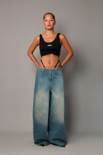 Джинсы бананы