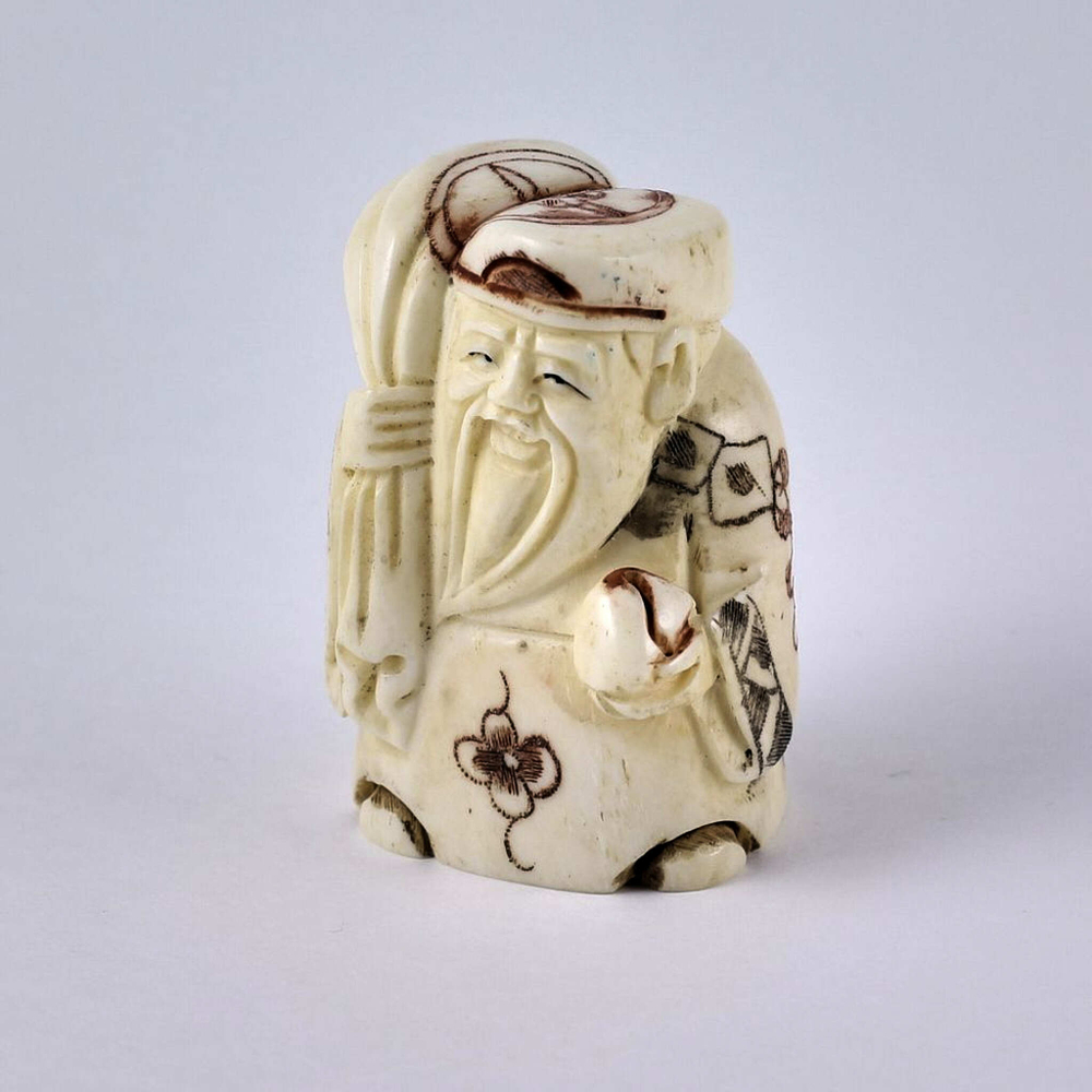 Нэцкэ Дзюродзин с мешком риса