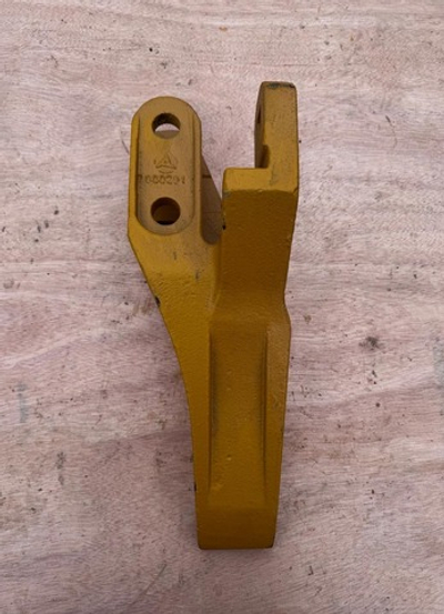 Зуб болтовой левый 132799000291А