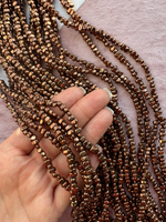 Нить гематитовых бусин 5-6мм, галтовка