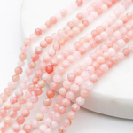 Опал розовый граненый бусины, диаметр около 3-3,2 мм, цена за отрезок 19 см (1/2 нити)