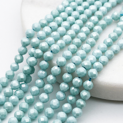 Фианит "матовый" (кубический цирконий), цвет голубой, размер около 4 мм, цена за отрезок 18 см (1/2 нити)