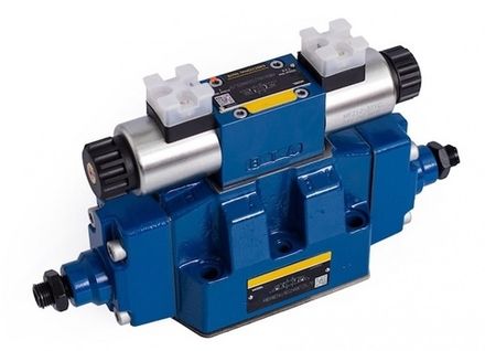 4WEH16J7X/6EG24N9ETS2K4/10D3 - Гидрораспределитель с электроуправлением Ду16 схема J (34), напряжениепитания 24В DC, с регулировкой хода основного золотника с двух сторон