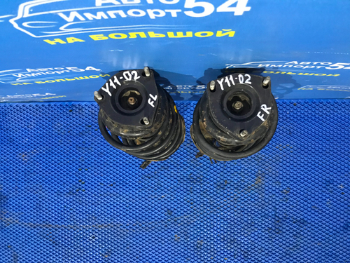 Стойка передняя левая NISSAN AD 1999