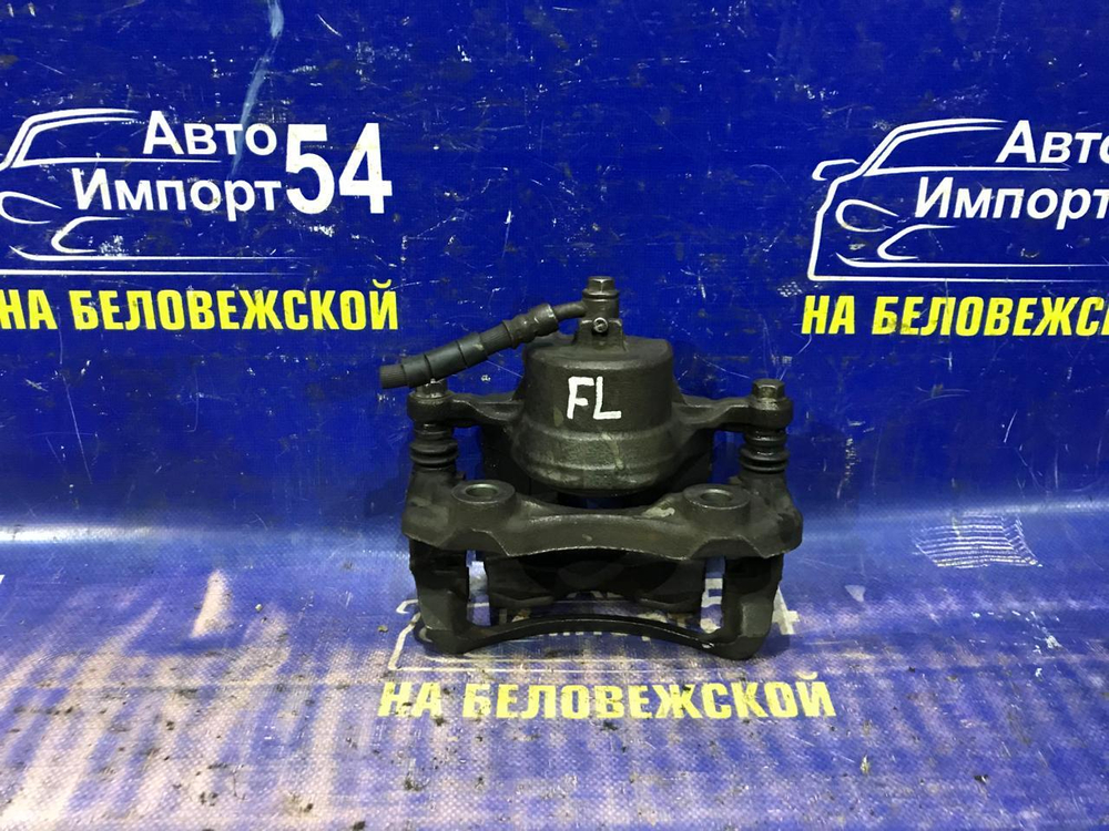 Суппорт тормозной передний левый NISSAN PRIMERA 1997